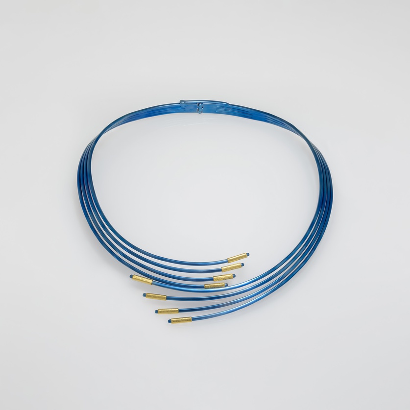 Bold titanium necklace with gold edges