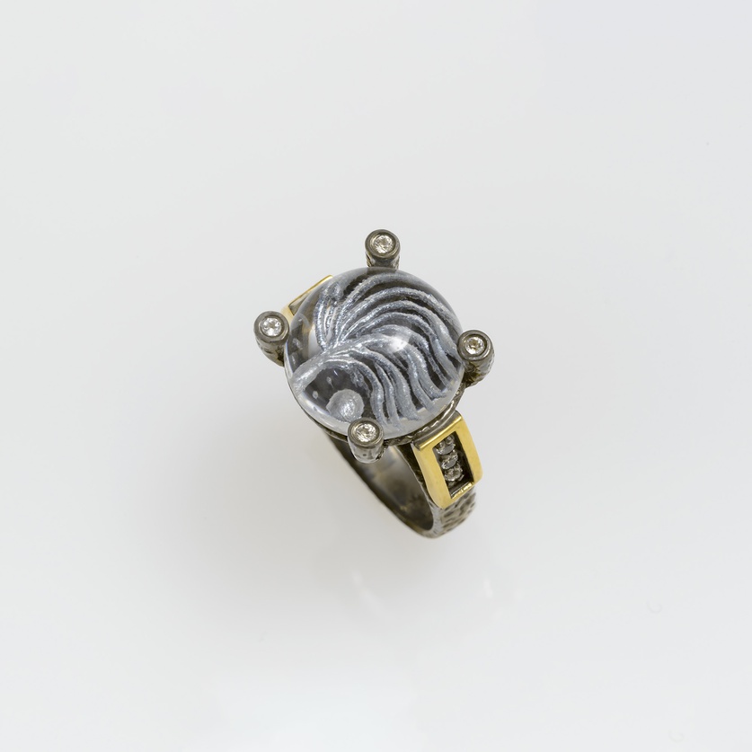 Hand engraved quartz ring in silver and gold with topaz