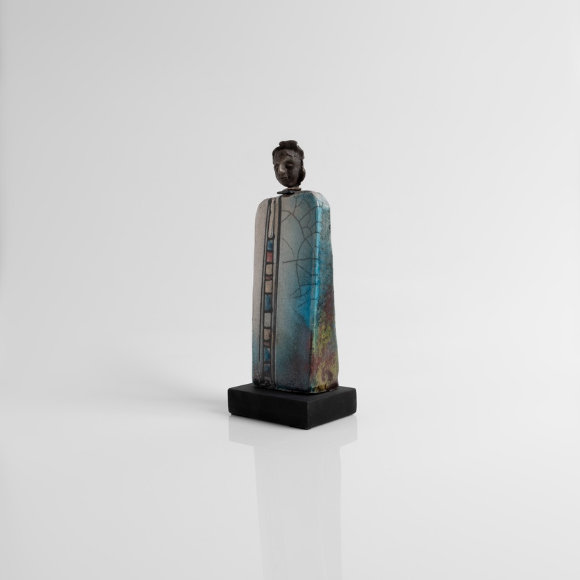 Square-shaped ceramic human figure