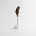 Bronze mask-sculpture on a marble base