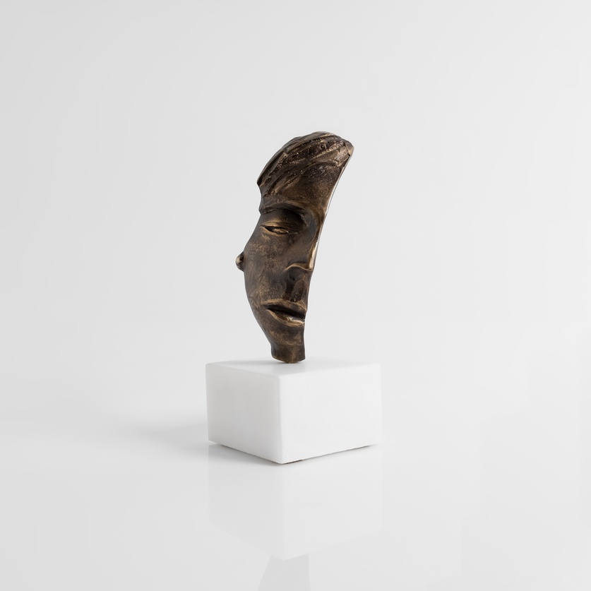 “Face” Sculpture on a marble base