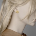 Gold stud earrings in spiral shape