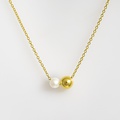 Silver necklace with gold plating and freshwater pearl