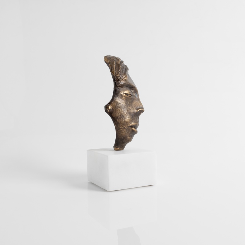 “Face” Sculpture on a marble base