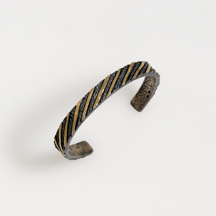 Elegant Silver and Gold Bracelet