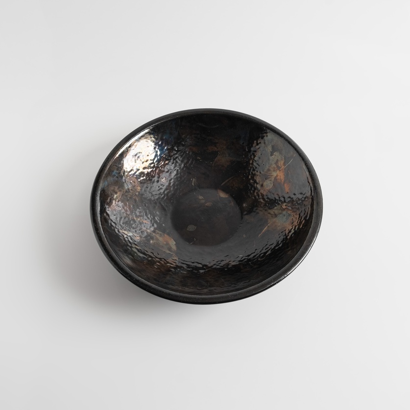 Black platter with iridescent surface
