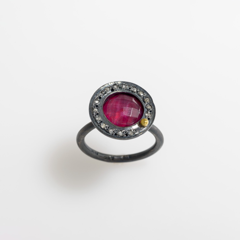 Silver ring with ruby doublet stone and diamonds