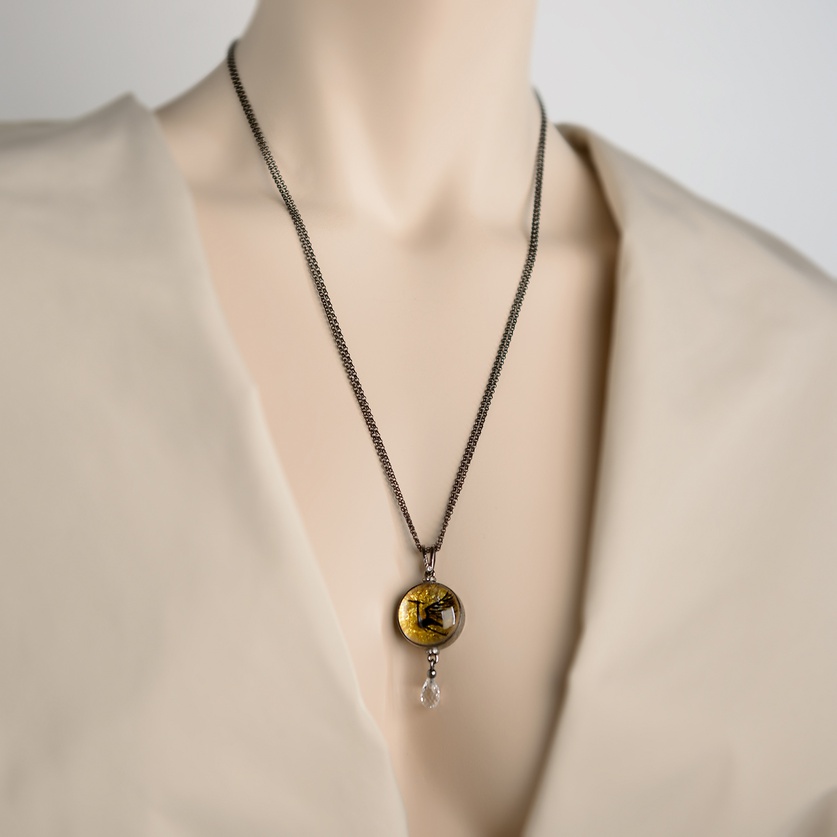 "Phoenix" necklace in silver with rock quartz & topaz