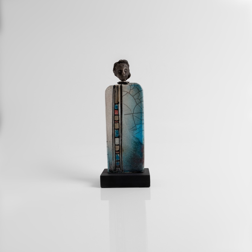Square-shaped ceramic human figure