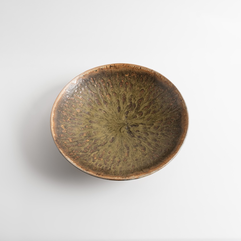 Ceramic platter in earthy tones