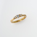 Exquisite Engagement Ring With Three Brilliant-Cut Diamonds