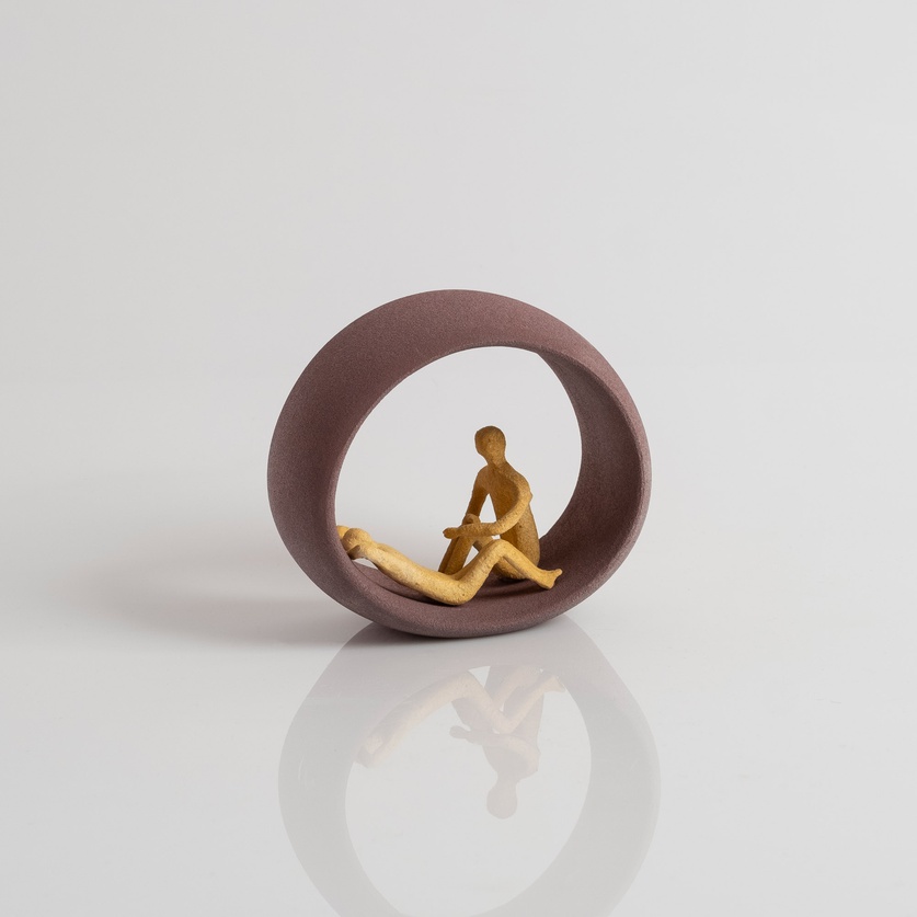 A couple in a circular frame