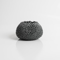 Black perforated candle holder