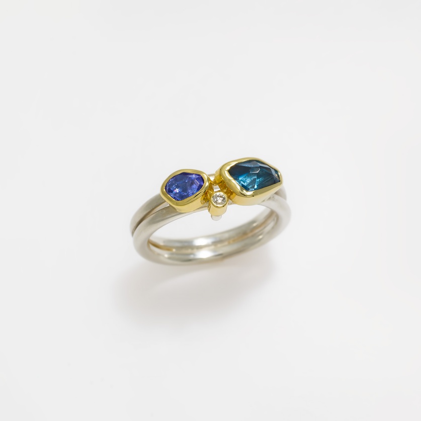 Stunning ring with blue topaz, tanzanite and diamond