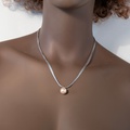 Silver necklace with pink pearl and quadruple chain