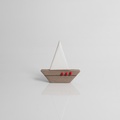 Ceramic sailboat with white sail