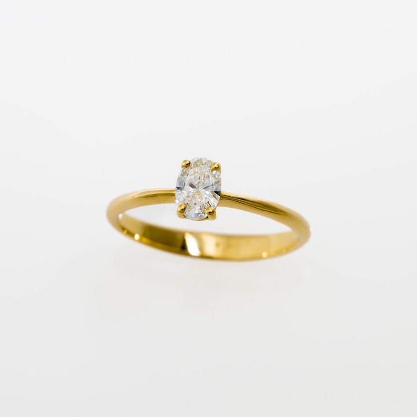 Gold Engagement Ring With Oval-Cut Diamond
