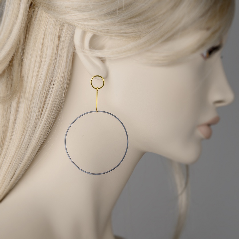 Long sleek double hoops in gold and oxidized silver