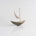 Olive-colored ceramic sailboat