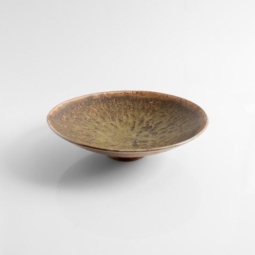 Ceramic platter in earthy tones