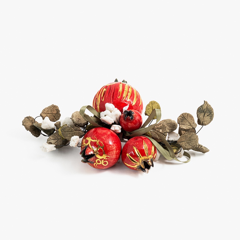 Decorative composition with ceramic pomegranates