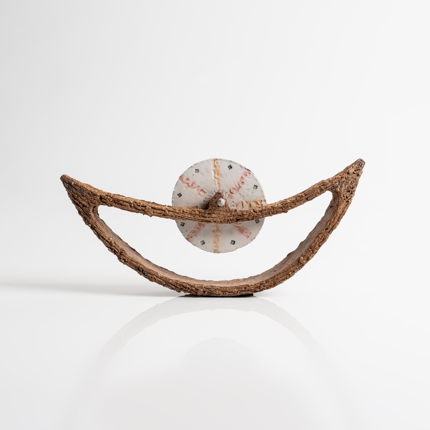 Ceramic boat with disc