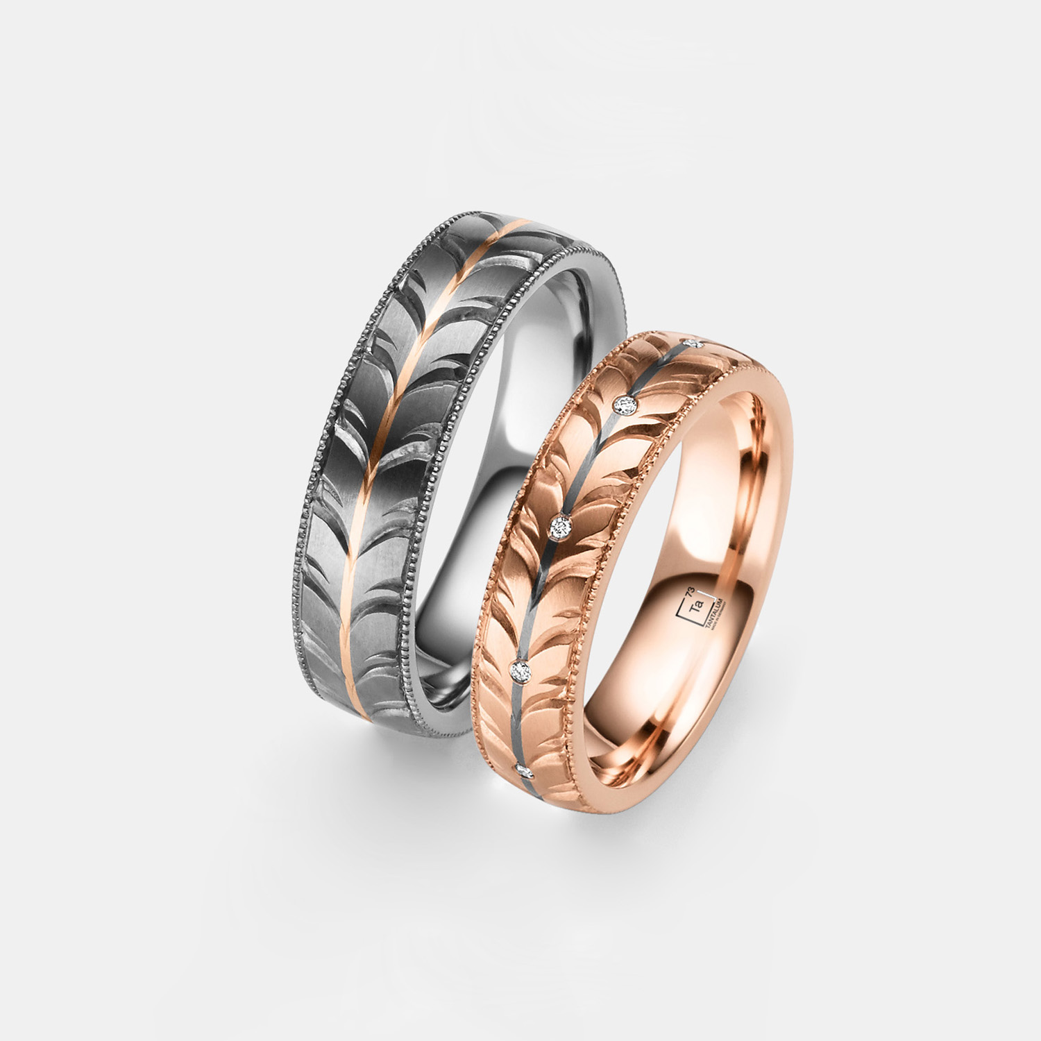Wedding Rings in Tantalum & Rose Gold with an Embossed Leaf Pattern