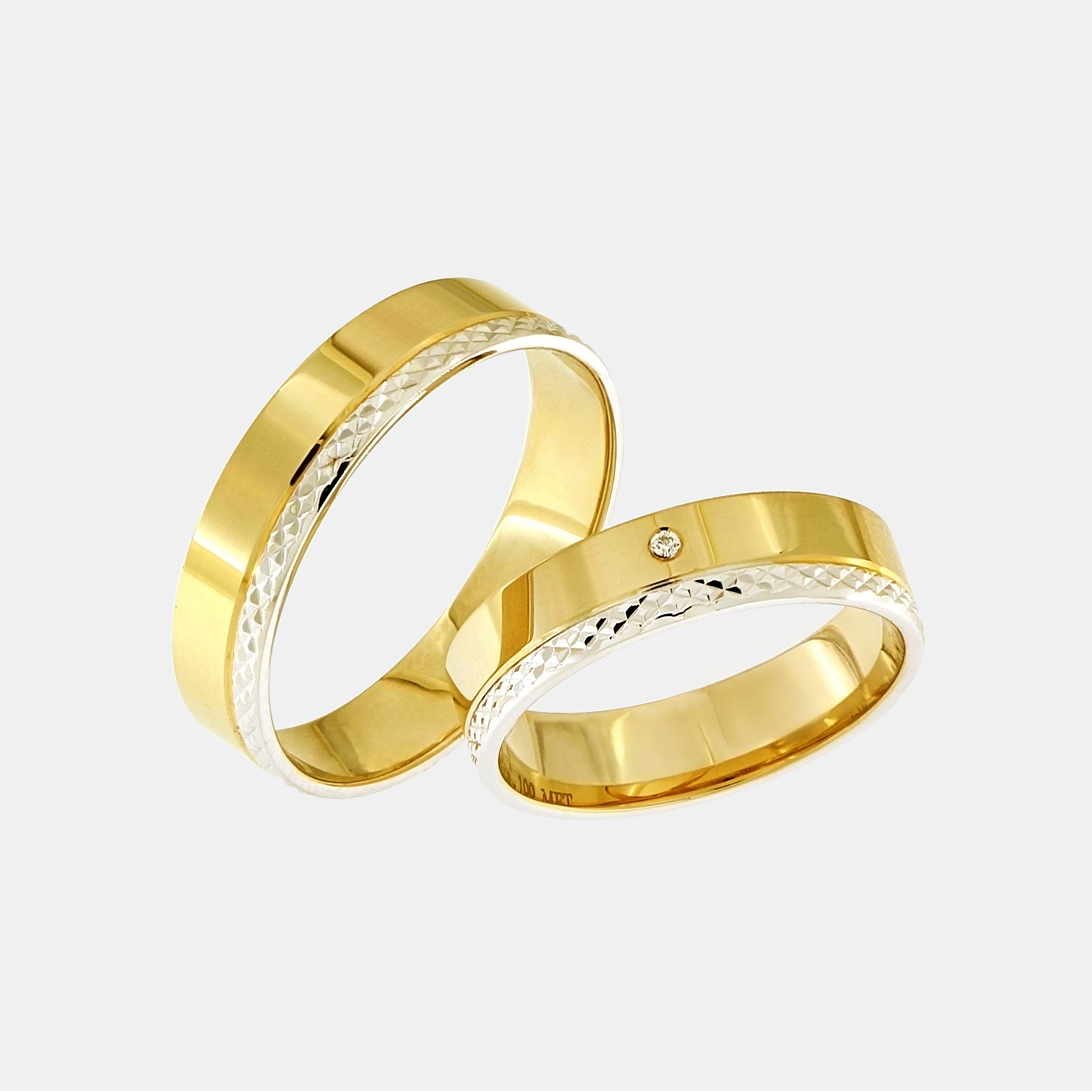 Gold wedding rings with diamond-cut edges & diamond